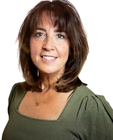 Portrait of a smiling woman with shoulder-length brown hair wearing an olive green top.